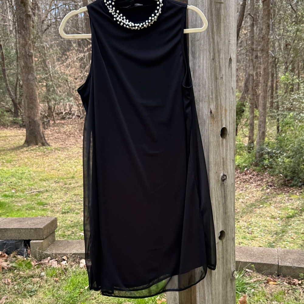 Classic Black Sleeveless Mini Dress with Pearl-Trim Neckline